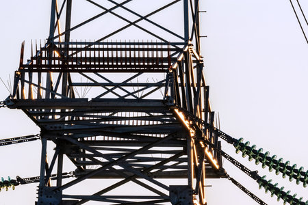 High voltage power line at sunset.