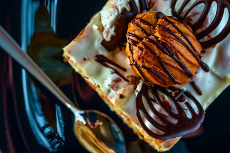A piece of tiramisu cake close up.