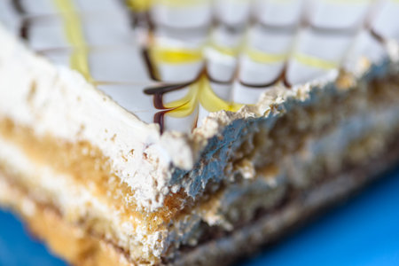 Sponge cake on a wooden background photographed close-up.の写真素材