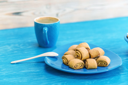 Coffee mug on a blue background.の写真素材