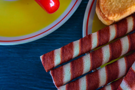Striped wafer rolls with condensed milk