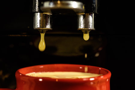 drops of coffee from the coffee makerの写真素材