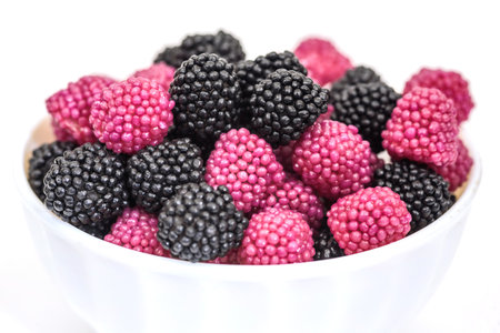 Fruit jelly in the form of berries on a white background.の写真素材