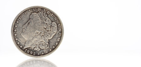 American metal coins on a white background.の写真素材