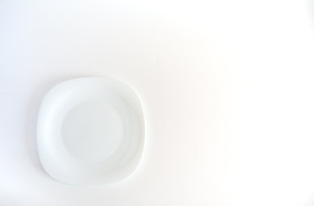 white plate on a backgroundの写真素材