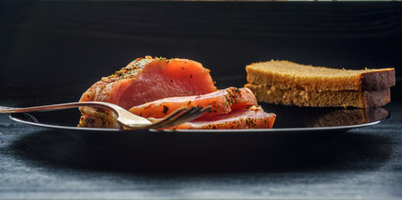 salted pork tenderloin on a plate close upの写真素材