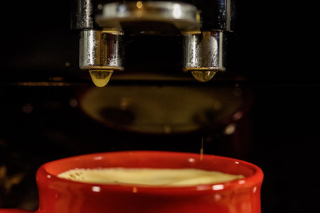 drops of coffee from the coffee makerの写真素材