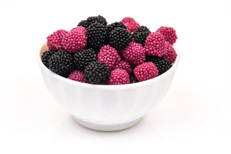 Fruit jelly in the form of berries on a white background.の写真素材