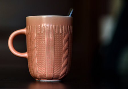 cup of coffee close up on a dark backgroundの写真素材