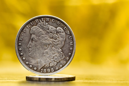 American coins on a golden background.