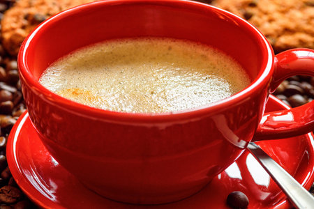 coffee in a red cup closeupの写真素材