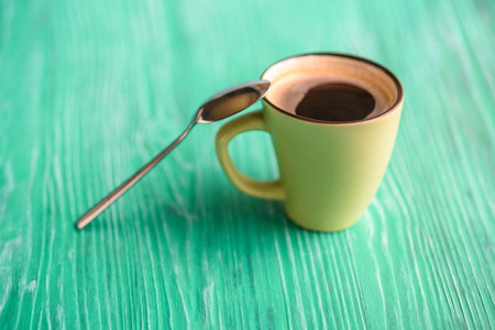 Closeup coffee mug on wooden background.の写真素材