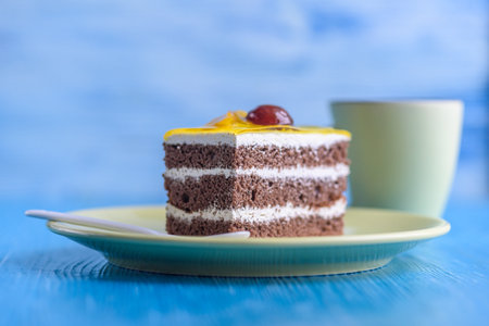 Biscuit cake with fruit tops photographed close-up.の写真素材