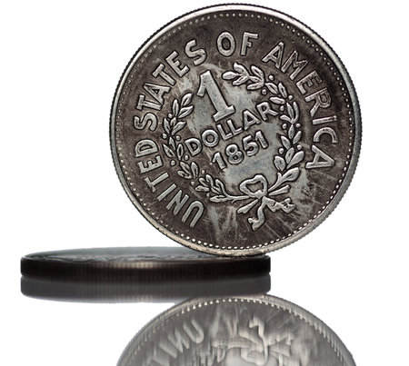 Vintage american coins isolated on white background.の写真素材