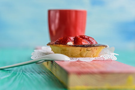 Cake with berries on a wooden background.の写真素材