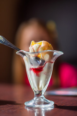 Ice cream in a glass vase. Photographed close-up.