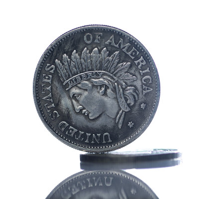 Vintage american coins isolated on white background.の写真素材