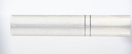 Cigarettes close up on a white background.の写真素材