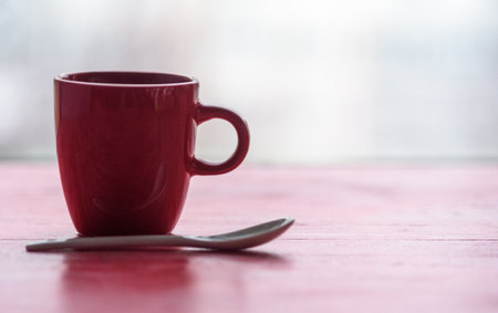 Closeup coffee mug on wooden background.の写真素材