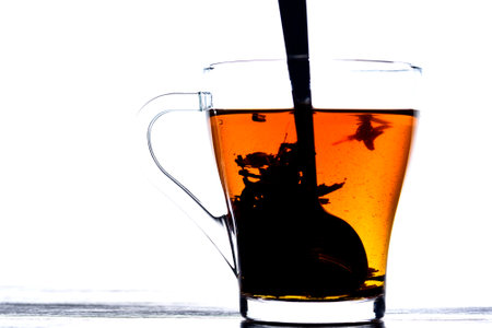 tea in a transparent mug on a white backgroundの写真素材