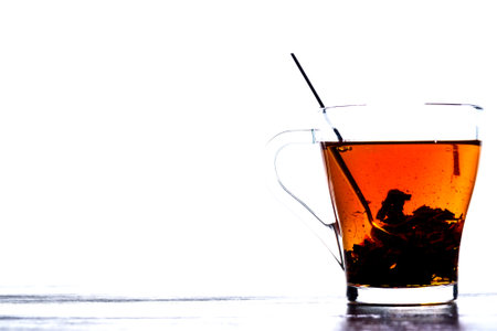 tea in a transparent mug on a white backgroundの写真素材
