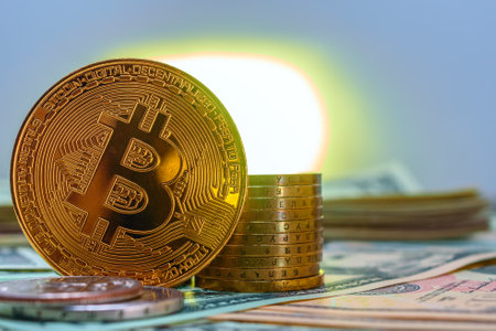 golden bitcoin on the background of dollar bills and a burning candle