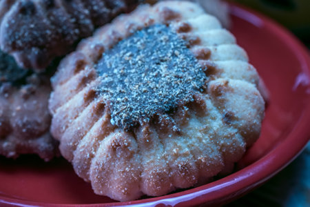 Chocolate chip cookies on a red plate. Selective focus.
