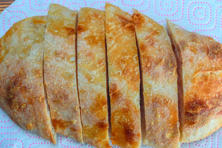 Fried pancake on white tablecloth texture background.の写真素材
