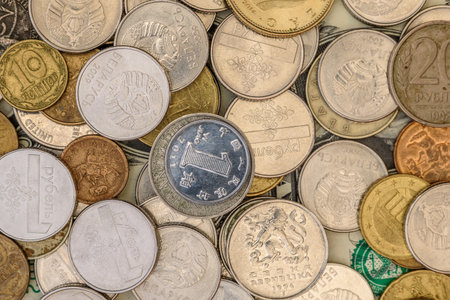 Coins from different countries. Different countries of the world. Backgroundの写真素材