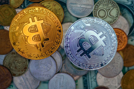 Bitcoin on the background of coins. Bitcoin is a modern way of exchange and this crypto currency is...