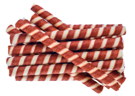 Striped wafer sticks isolated on white background. Top view.の写真素材