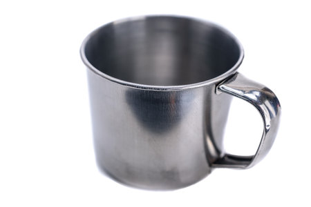 Metal mug on a white background. Clipping path included for easy isolation.の写真素材