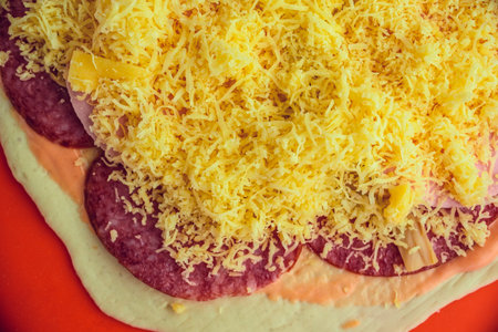 Pizza with salami and cheese, close upの写真素材