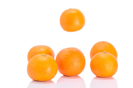 Fresh tangerine or mandarin fruit isolated on white background.の写真素材