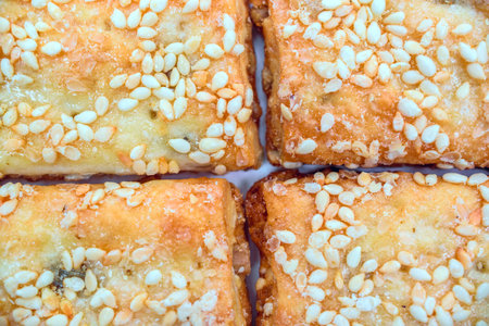 Biscuits with sesame seeds, close-up, top view