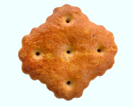 Close up of a cracker biscuit isolated on white background.の写真素材