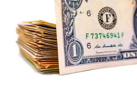 Dollar banknotes isolated on a white background. Shallow DOFの写真素材