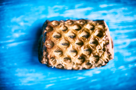Puff pastry with jam on a wooden background. Photographed close-up.