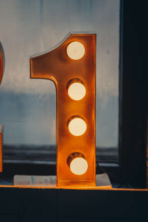 New Year 2021 Creative Design Concept numbers from yellow bulbs one 1の写真素材