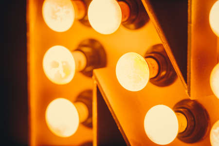 New Year 2021 Creative Design Concept letters from yellow bulbsの写真素材