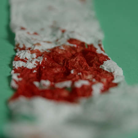 Blood on the hygiene napkin Bloody wound Skincare mockup for design Stack of disposable napkins on a blue backgroundの写真素材