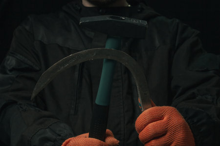 This is how the worker showed the sickle-hammer figure the symbol of communism