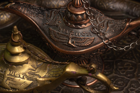 Aladdin's magic lamp isolated on black background