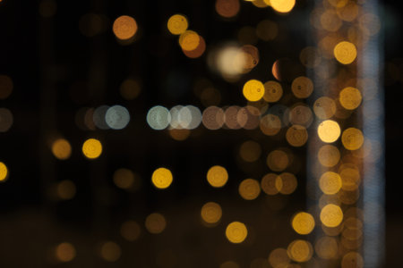 Christmas background Festive abstract background with bokeh defocused and focused lights