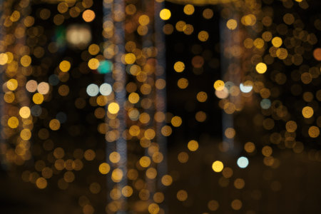 Christmas background Festive abstract background with bokeh defocused and focused lights