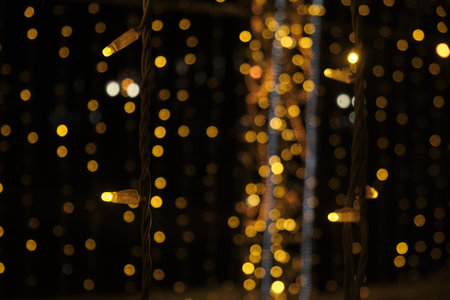 Christmas background Festive abstract background with bokeh defocused and focused lights