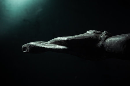 christian crucifix and rosary beads on abstract grey background. spiritual symbol of Lent. Orthodox, Catholic, Protestant religion, faith in God, Church holiday concept. flat layの写真素材