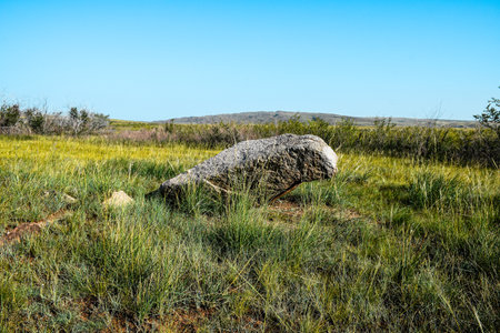 Beautiful landscape in Khakassia with a large stone in the foregroundの写真素材