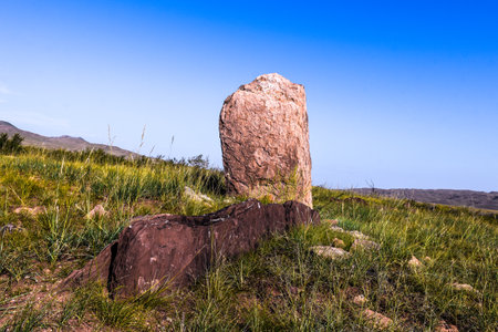 Huge stone in a meadow Khakassia, Siberia, Russia,の写真素材