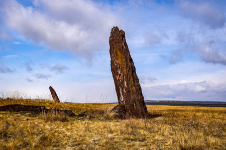 Ancient stone in the grasslands of Khakassia, Siberia, Russia. Summer sunny day.の写真素材
